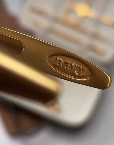 Navy professional manicure tool in gold steel with engraved Navy logo